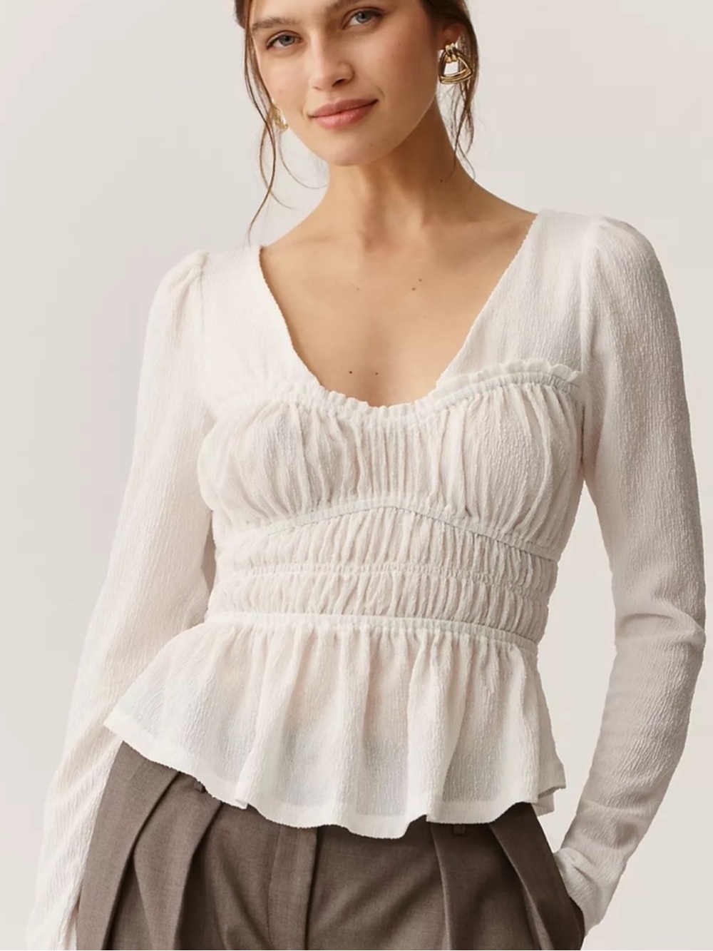 Anthropologie White Smocked Peplum Long-Sleeve Top